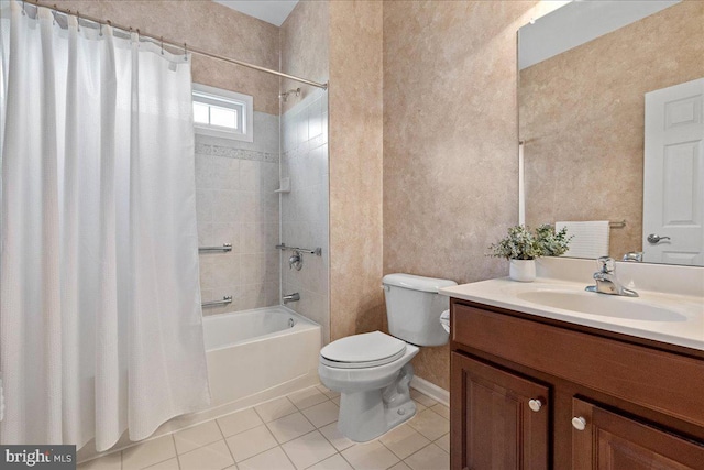 full bath with vanity, tile patterned floors, toilet, and shower / bath combo with shower curtain