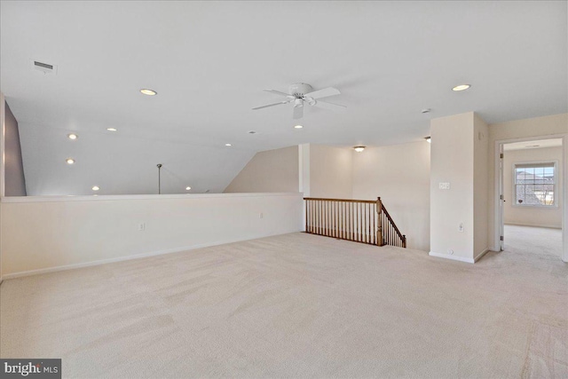 carpeted empty room with recessed lighting, visible vents, baseboards, and a ceiling fan