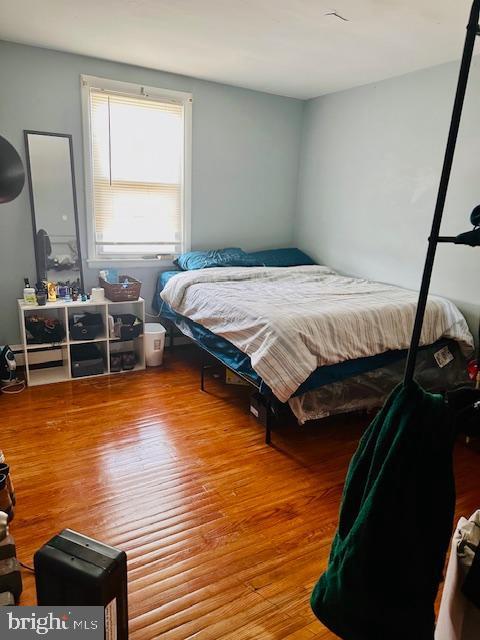 bedroom featuring hardwood / wood-style floors