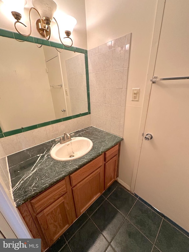 bathroom featuring tile patterned floors and vanity