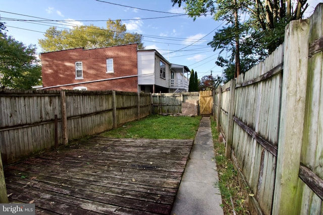 view of yard featuring a wooden deck