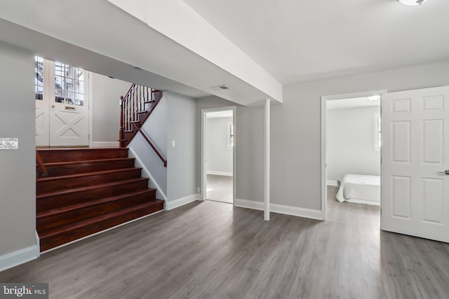 basement featuring hardwood / wood-style floors