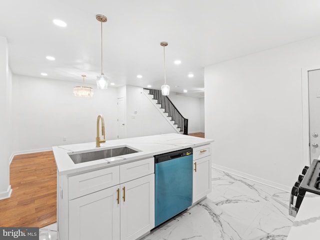 kitchen featuring recessed lighting, white cabinets, dishwasher, and a sink