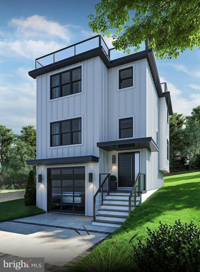 view of front facade with a garage and a front lawn