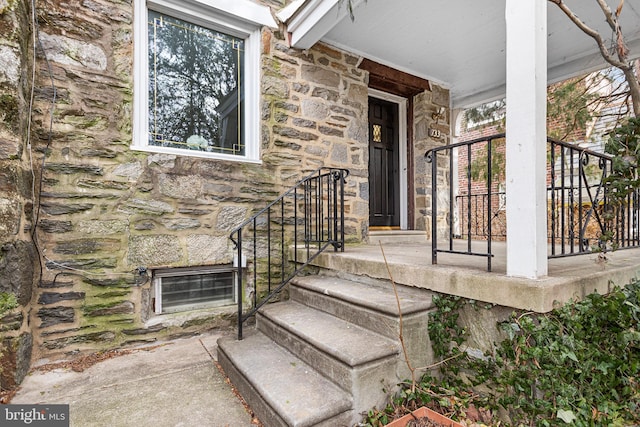 view of exterior entry with stone siding