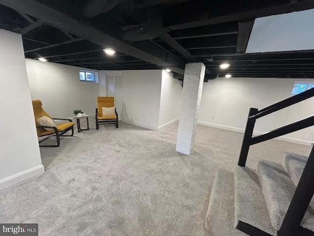 basement with carpet flooring