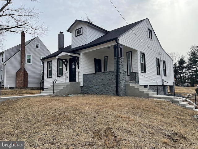 view of home's exterior featuring a yard