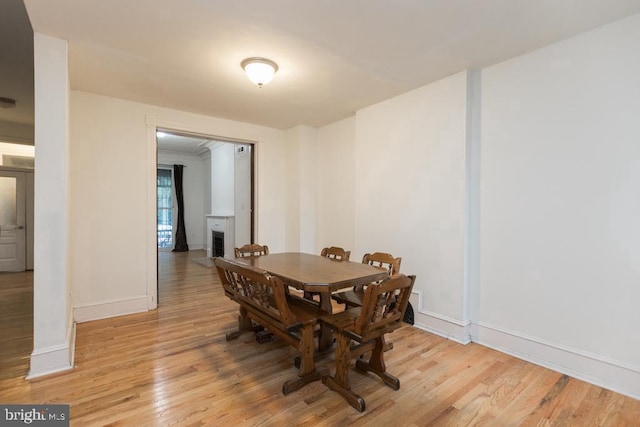 dining area with light wood-type flooring