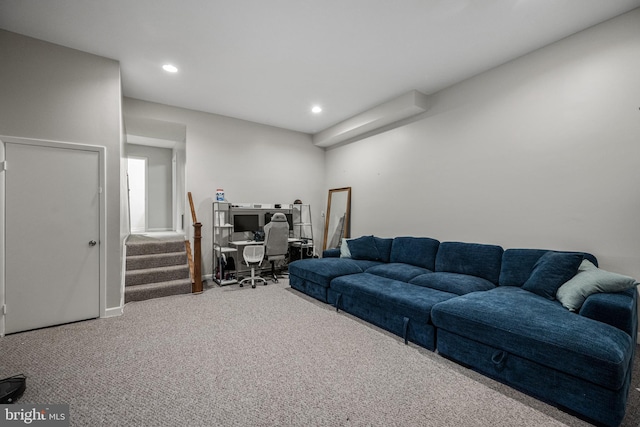 carpeted living area featuring baseboards, stairway, and recessed lighting