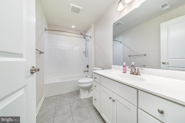 full bathroom with toilet, vanity, visible vents, and tile patterned floors