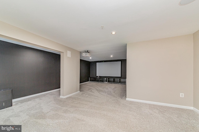 cinema room with carpet floors, recessed lighting, and baseboards