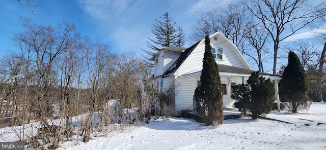 view of snow covered property