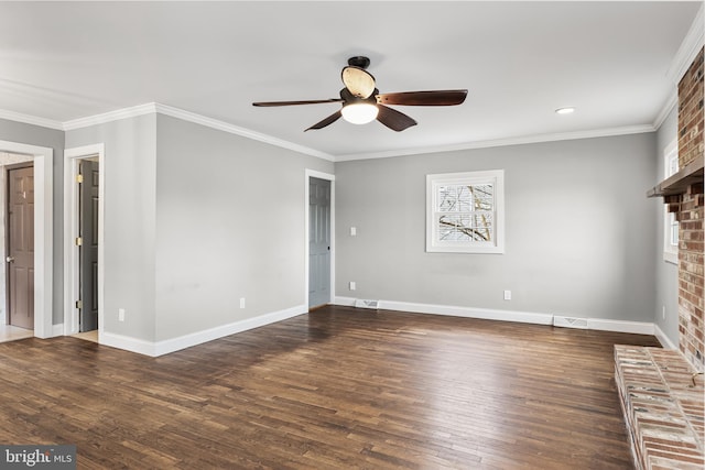 interior space with dark wood-style floors, crown molding, and baseboards