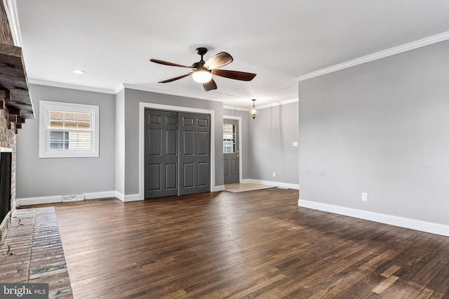 interior space featuring dark wood finished floors, a fireplace, and baseboards