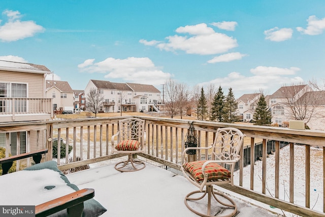 view of snow covered deck