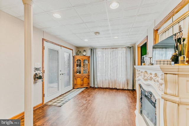 entryway with hardwood / wood-style floors