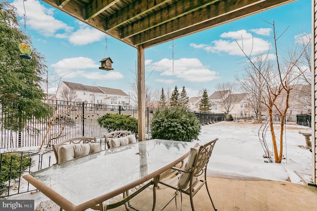 view of snow covered patio