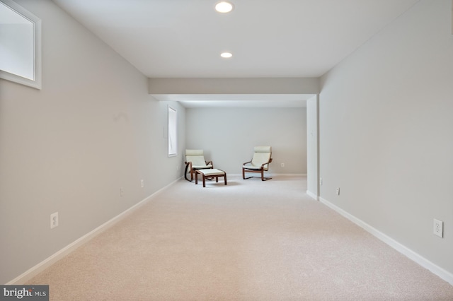living area with recessed lighting, carpet flooring, and baseboards