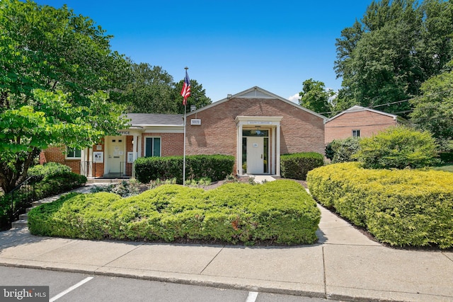 view of front of house featuring brick siding