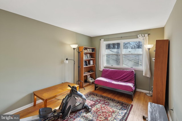 office featuring baseboards and wood finished floors