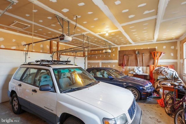 garage featuring a garage door opener