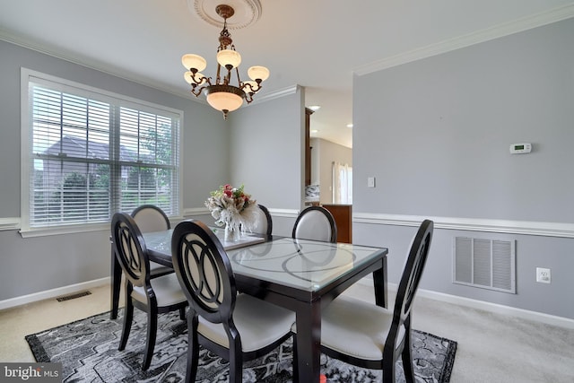 5816 Rockburn Woods Way, Elkridge, MD 21075 - dining space featuring a chandelier, crown molding, and light colored carpet