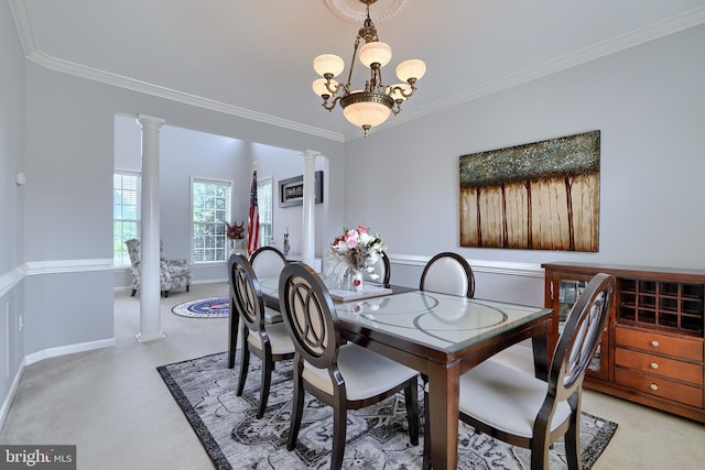 5816 Rockburn Woods Way, Elkridge, MD 21075 - dining area featuring ornamental molding, a chandelier, and decorative columns