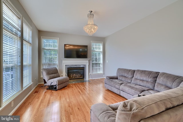 5816 Rockburn Woods Way, Elkridge, MD 21075 - living room featuring a premium fireplace and hardwood / wood-style floors