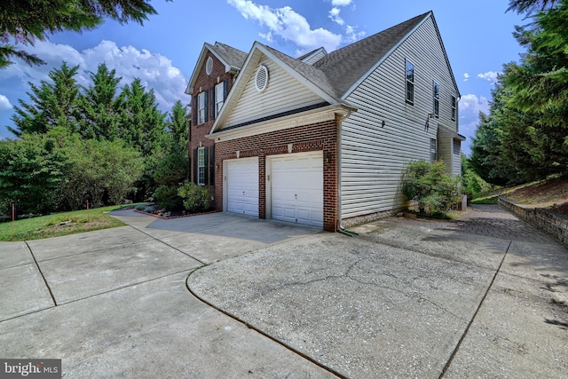 5816 Rockburn Woods Way, Elkridge, MD 21075 - view of home's exterior with a garage