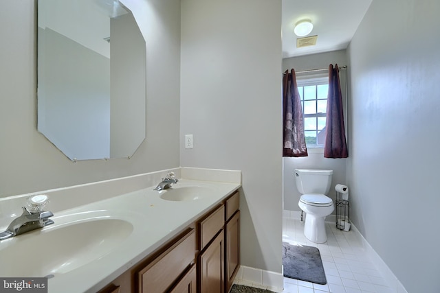 5816 Rockburn Woods Way, Elkridge, MD 21075 - bathroom featuring tile patterned floors, toilet, and vanity
