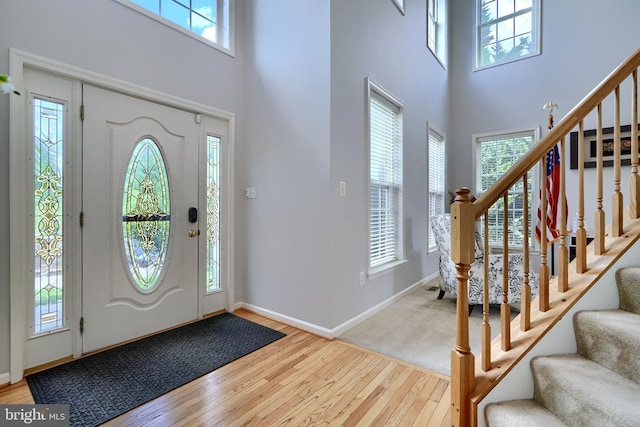 5816 Rockburn Woods Way, Elkridge, MD 21075 - entryway featuring a towering ceiling and light hardwood / wood-style floors