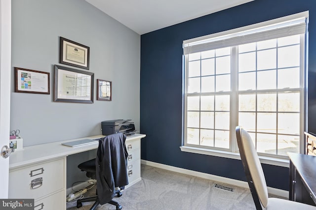 office with light carpet, visible vents, and baseboards