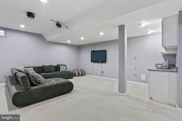 living room with light carpet, baseboards, and recessed lighting