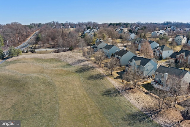 birds eye view of property with a residential view