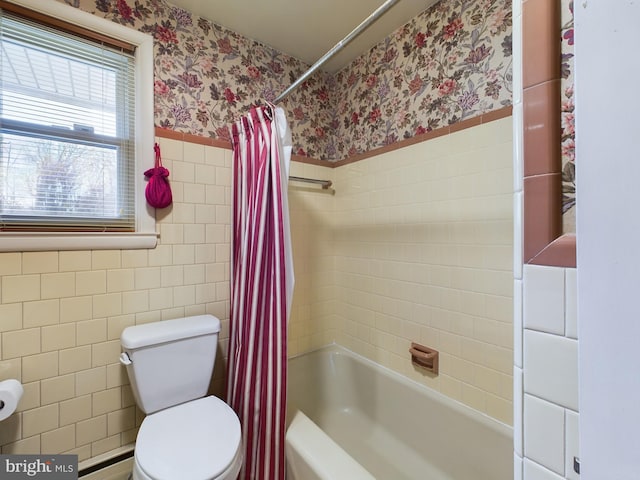 bathroom featuring shower / bath combo with shower curtain, tile walls, and toilet