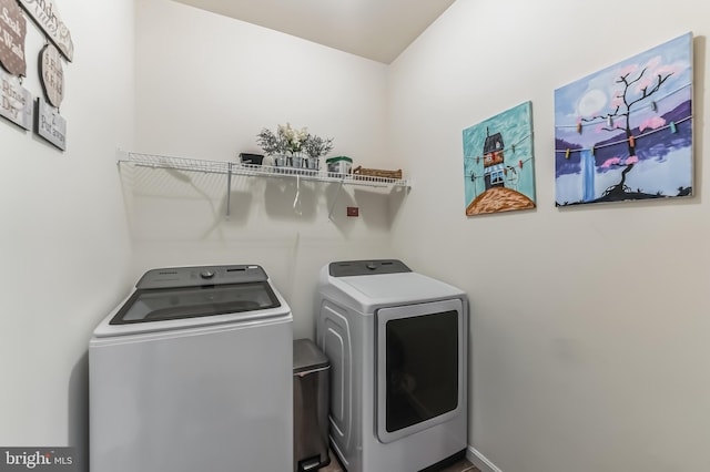 washroom featuring independent washer and dryer