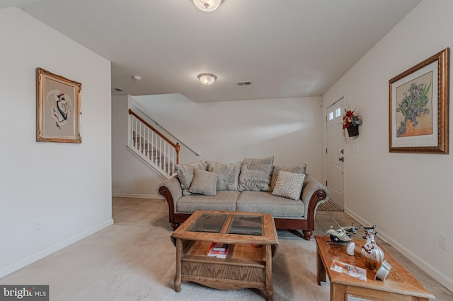 living room featuring light colored carpet