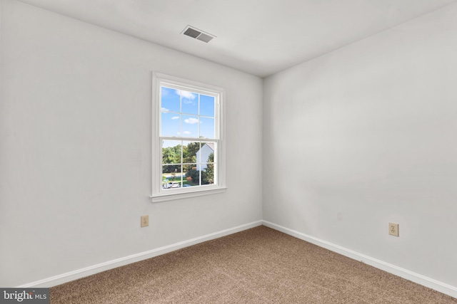 empty room with carpet floors