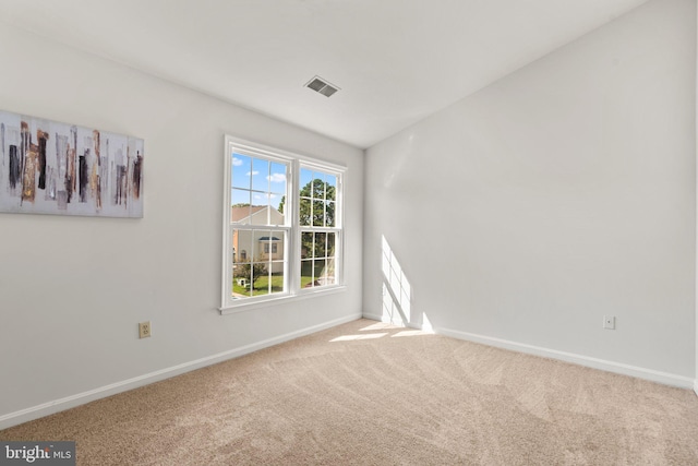 empty room with carpet flooring