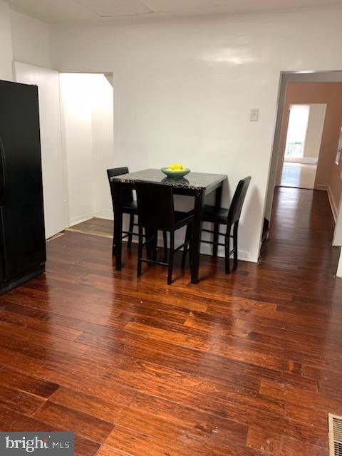 dining room featuring dark hardwood / wood-style floors