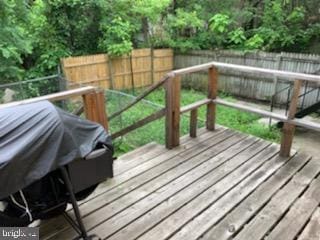 wooden deck featuring grilling area