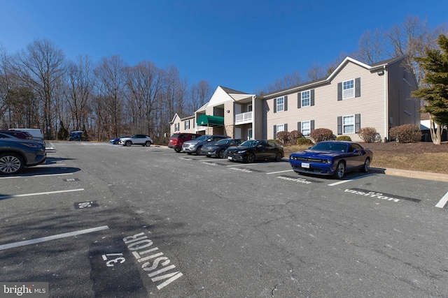 40 Smokewood Ct Unit 200, Stafford, VA 22554 - uncovered parking lot with a residential view