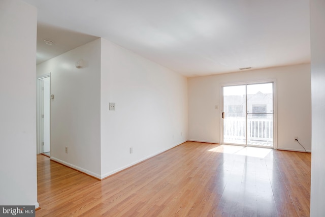 40 Smokewood Ct Unit 200, Stafford, VA 22554 - spare room with visible vents, light wood-style flooring, and baseboards