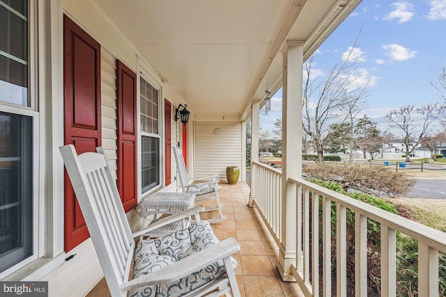 balcony featuring covered porch