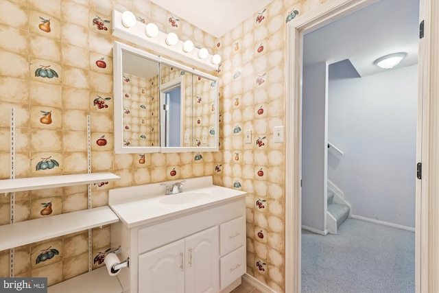 bathroom featuring vanity and baseboards