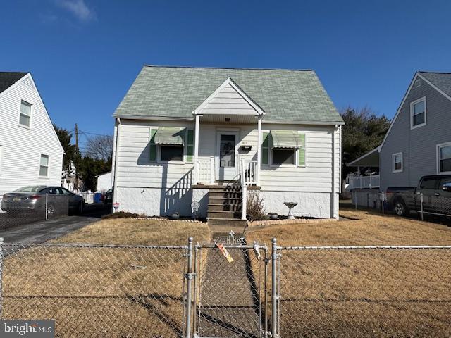 bungalow with a front yard