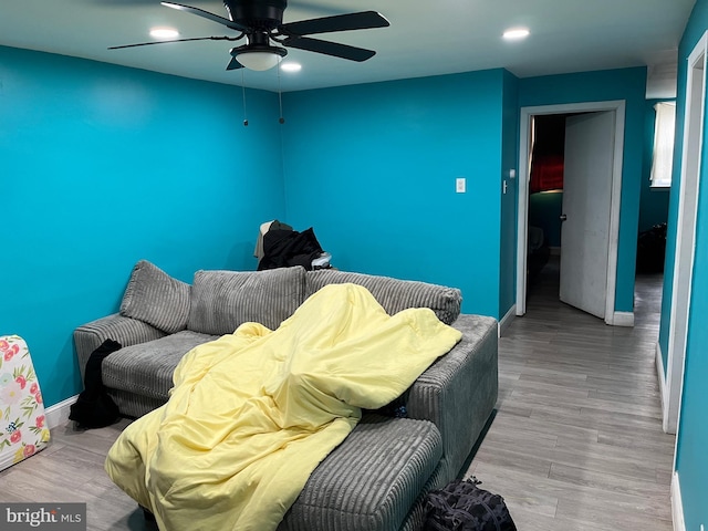 bedroom featuring ceiling fan and light wood-type flooring