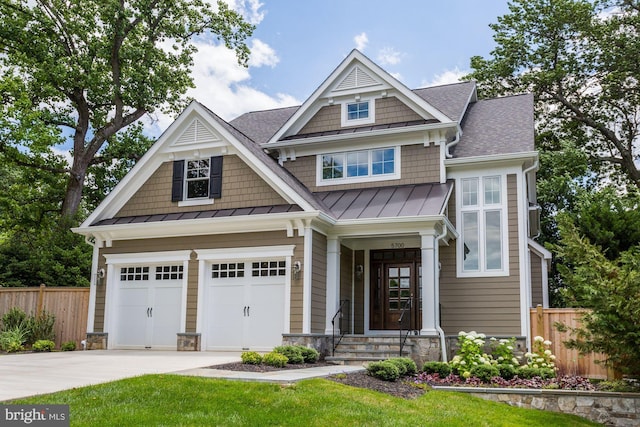 craftsman-style house featuring a garage