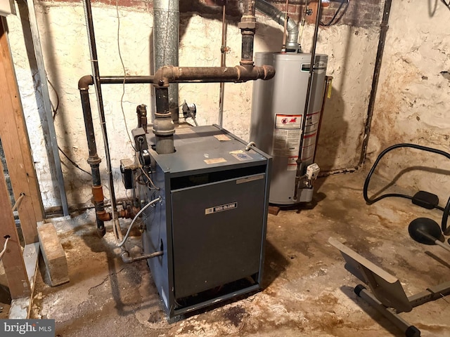 utility room featuring gas water heater and a heating unit