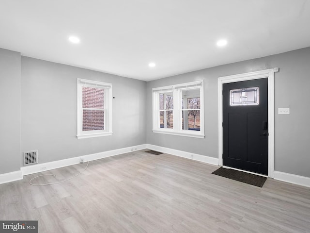 foyer featuring light hardwood / wood-style flooring